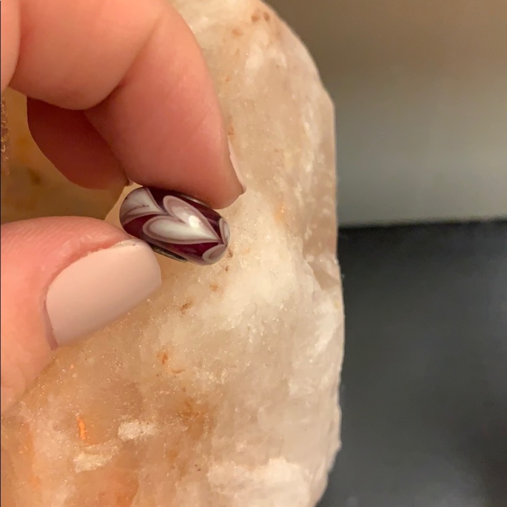 Handmade charm, maroon with hearts.